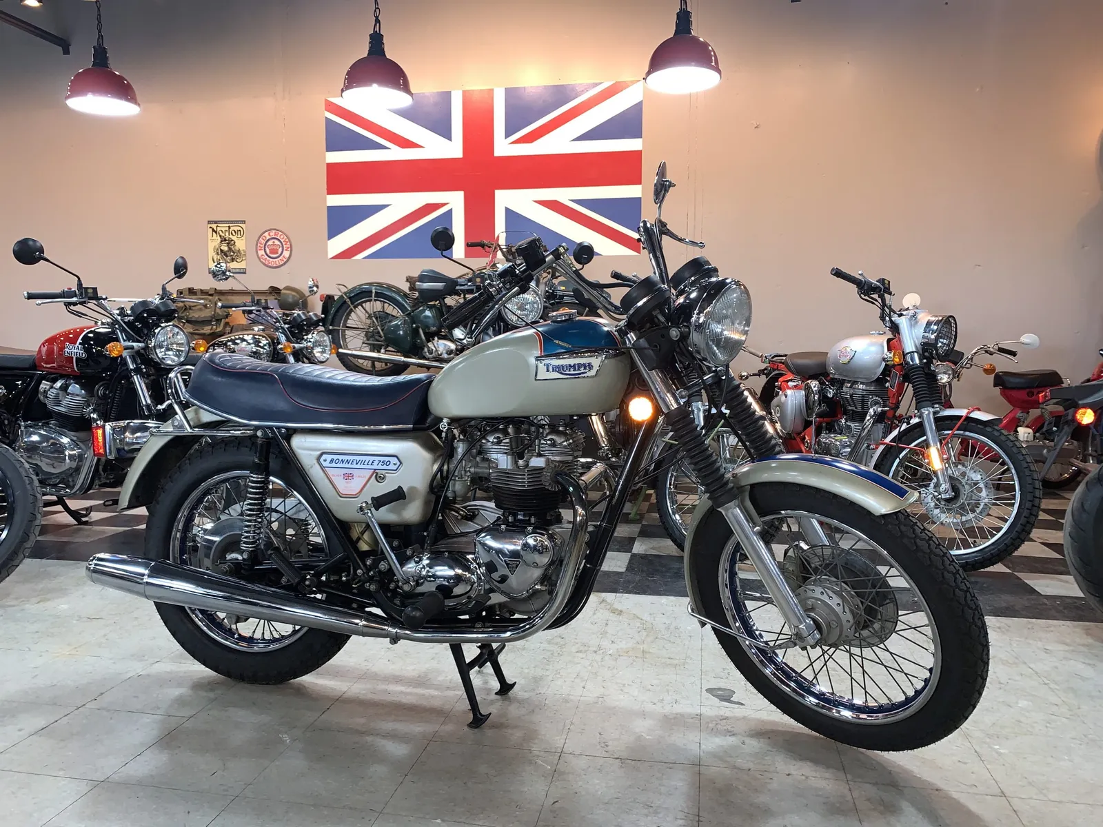 Used 1977 Triumph T140 “Silver Jubilee” in stock color, side profile, at The Motorcycle Shop San Antonio