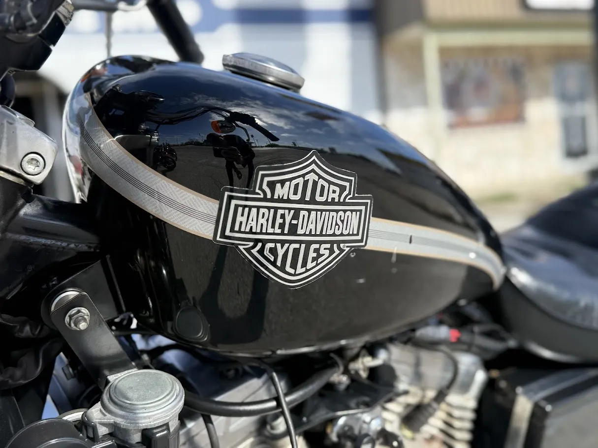 Used 1994 Harley-Davidson 883 Sportster in stock color, side profile, at The Motorcycle Shop San Antonio