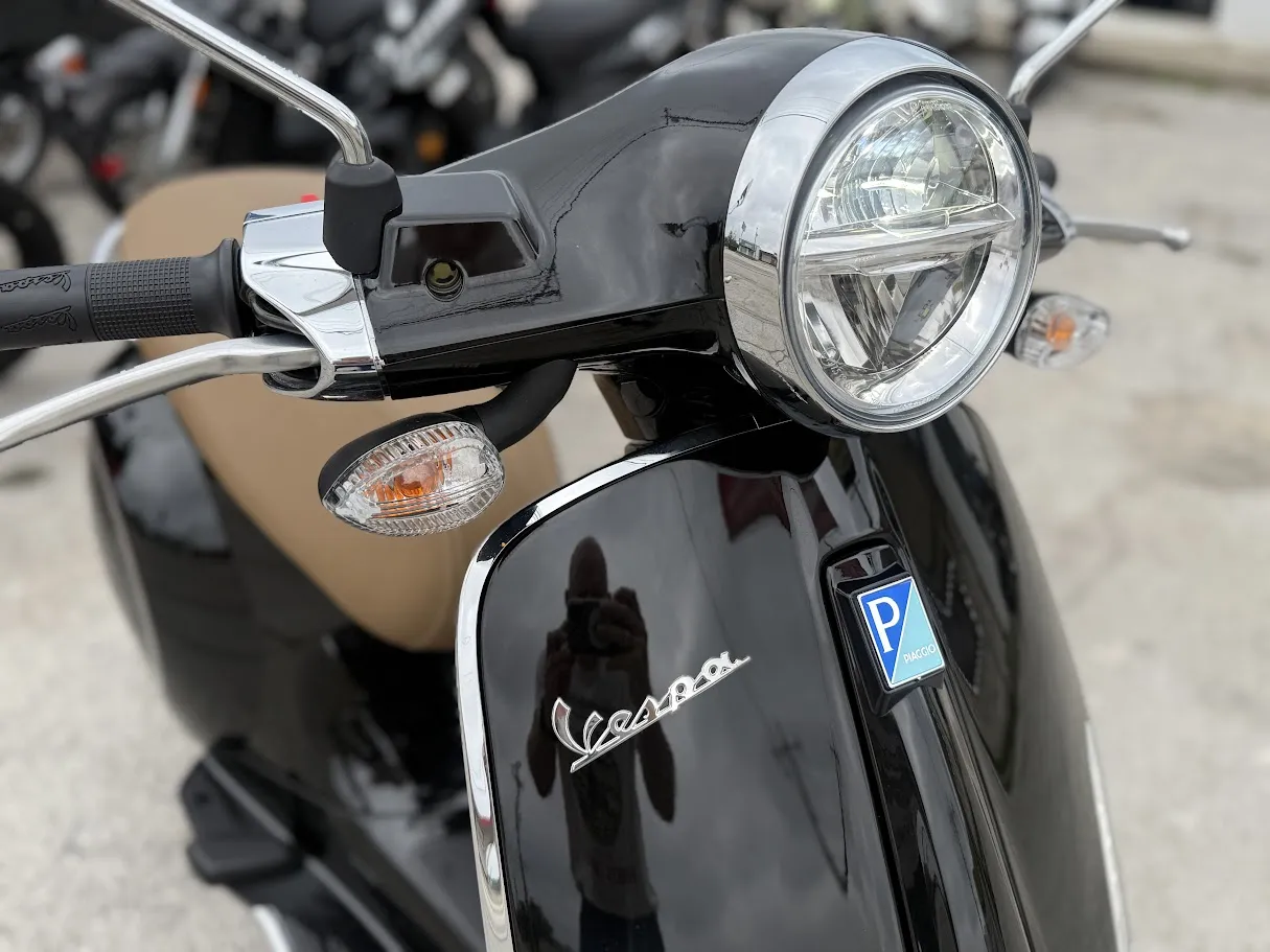 Used 2020 Vespa Primavera 150 only 169 miles! in stock color, side profile, at The Motorcycle Shop San Antonio