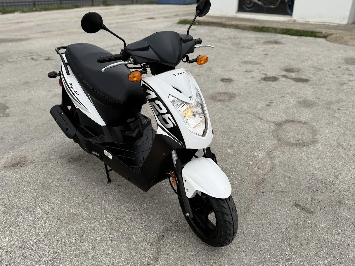 Used 2022 Kymco Agility 125 in stock color, side profile, at The Motorcycle Shop San Antonio