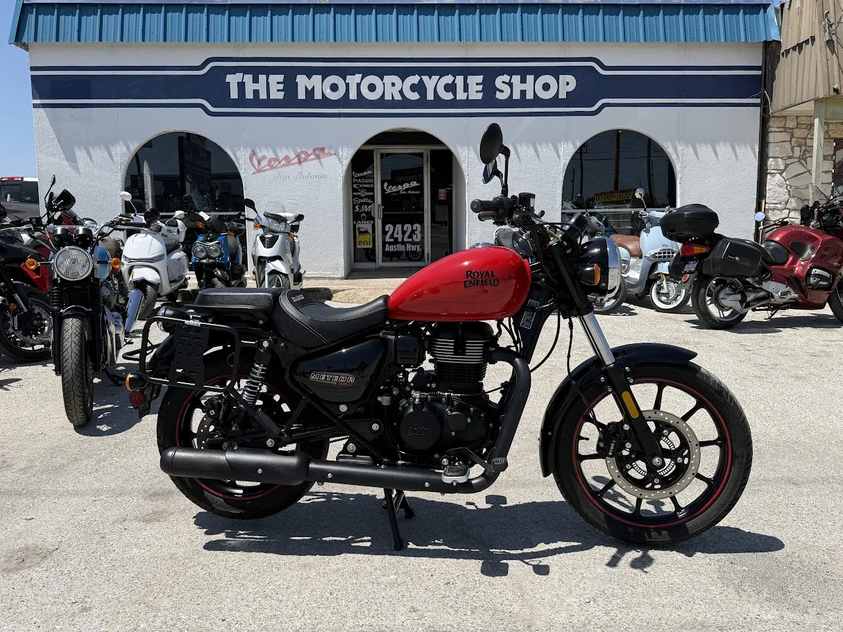 Used 2022 Royal Enfield Meteor 350 Fireball Red in stock color, side profile, at The Motorcycle Shop San Antonio