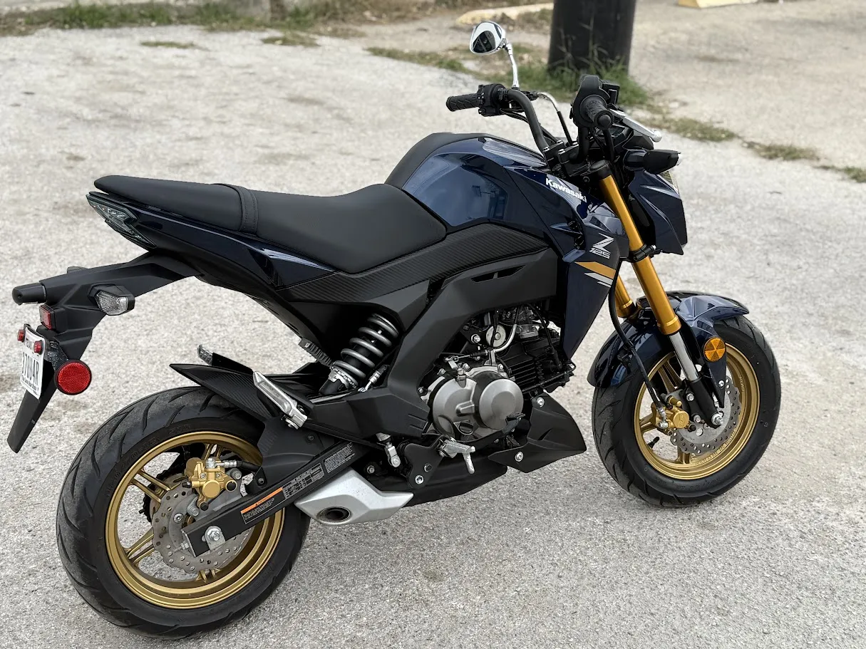 Used 2023 Kawasaki Z125 in stock color, side profile, at The Motorcycle Shop San Antonio