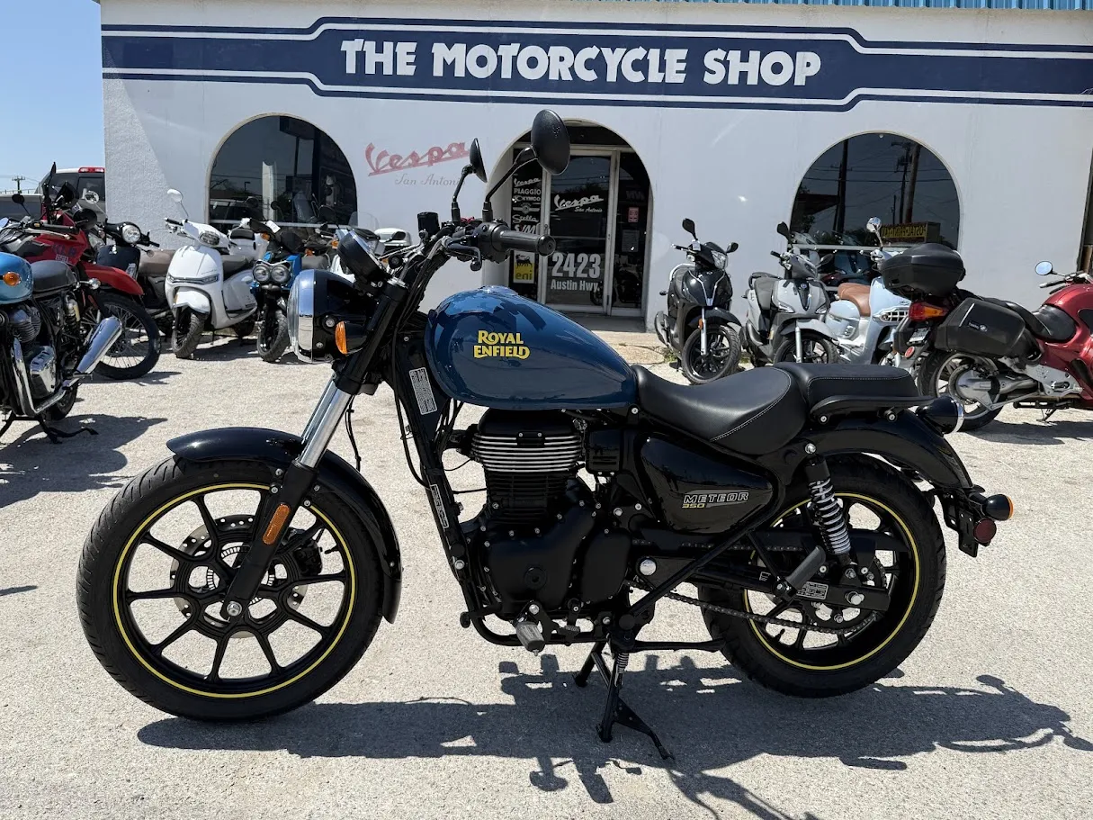 Used 2023 Royal Enfield Meteor 350 Fireball Blue in stock color, side profile, at The Motorcycle Shop San Antonio