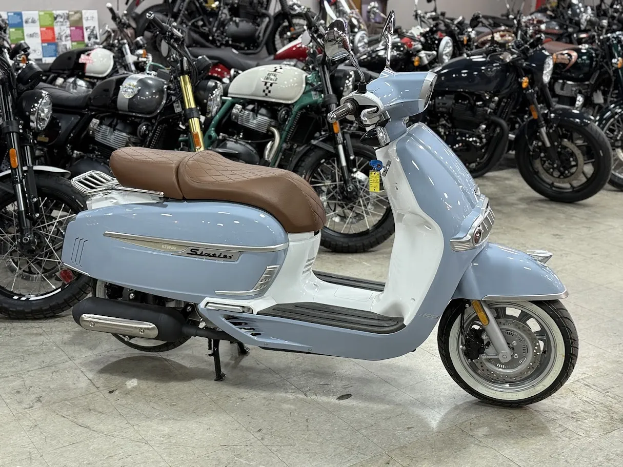 New Keeway Sixties 300i in stock color, side profile, at The Motorcycle Shop San Antonio