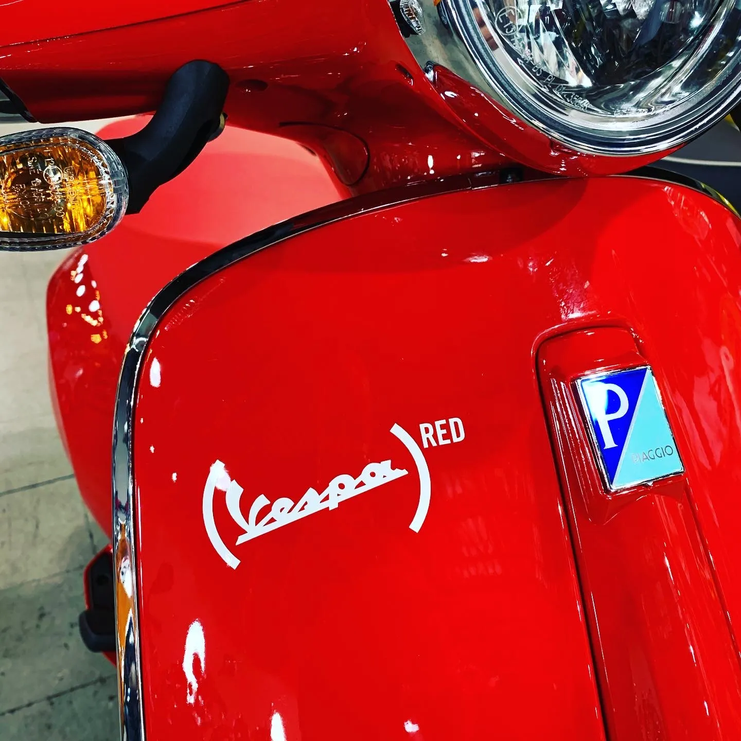 New Vespa “RED” Primavera 150 in Stock! in stock color, side profile, at The Motorcycle Shop San Antonio